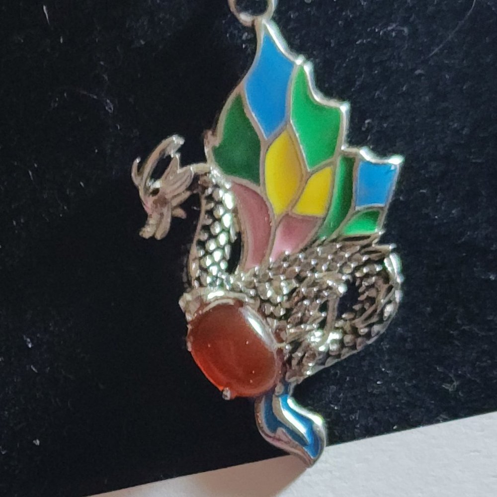 85.  Enhanced Red Agate Enameled Pendant Necklace 20 In in Stainless Steel